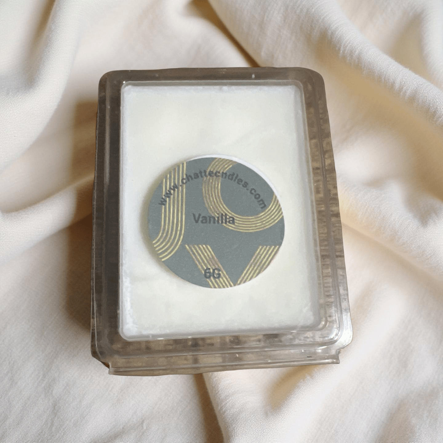 Vanilla scented wax melts in clear clamshell packaging with decorative label, by Chatté Candles Ice Cream collection