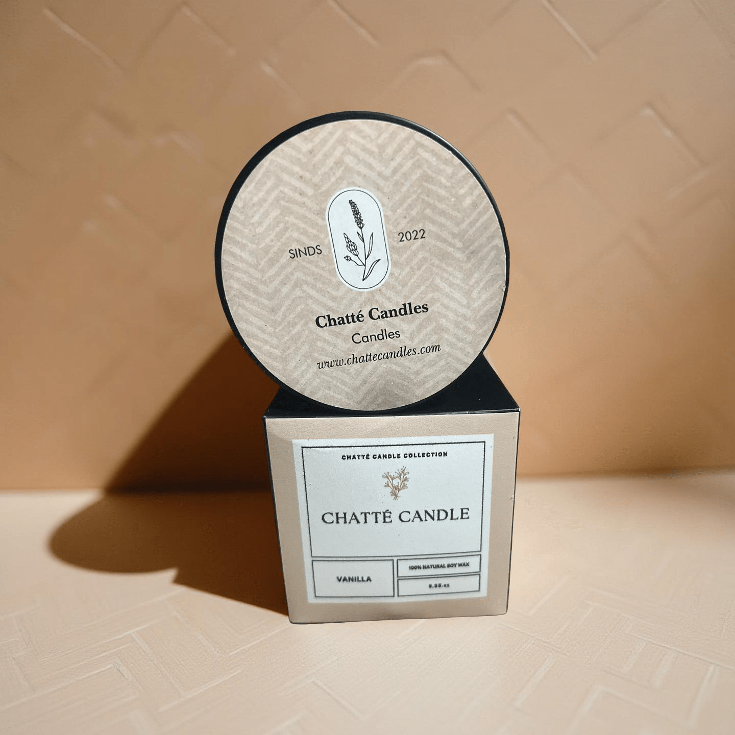 Vanilla Candle from Chatté Candles in neutral beige packaging with botanical logo, featuring 100% natural soy wax.